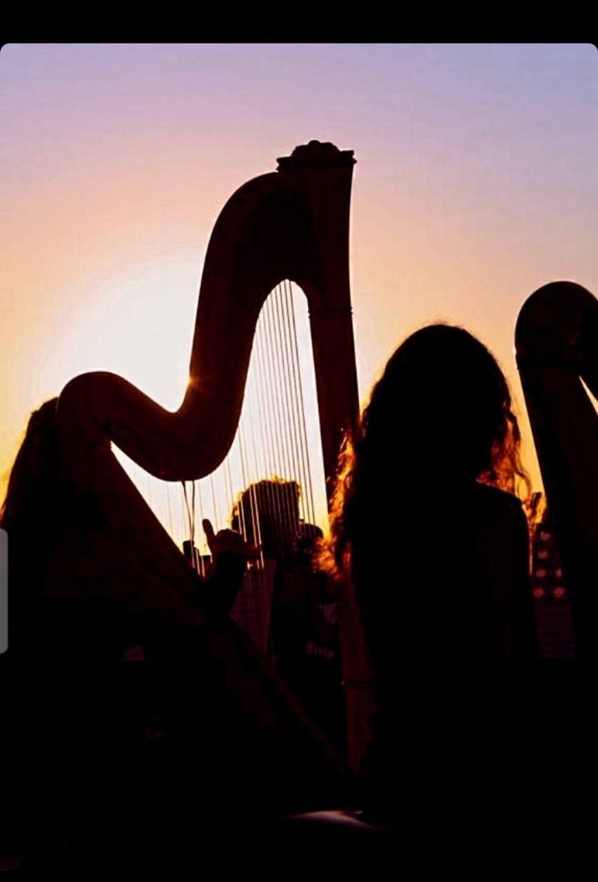 Irene Pauletto playing the harp