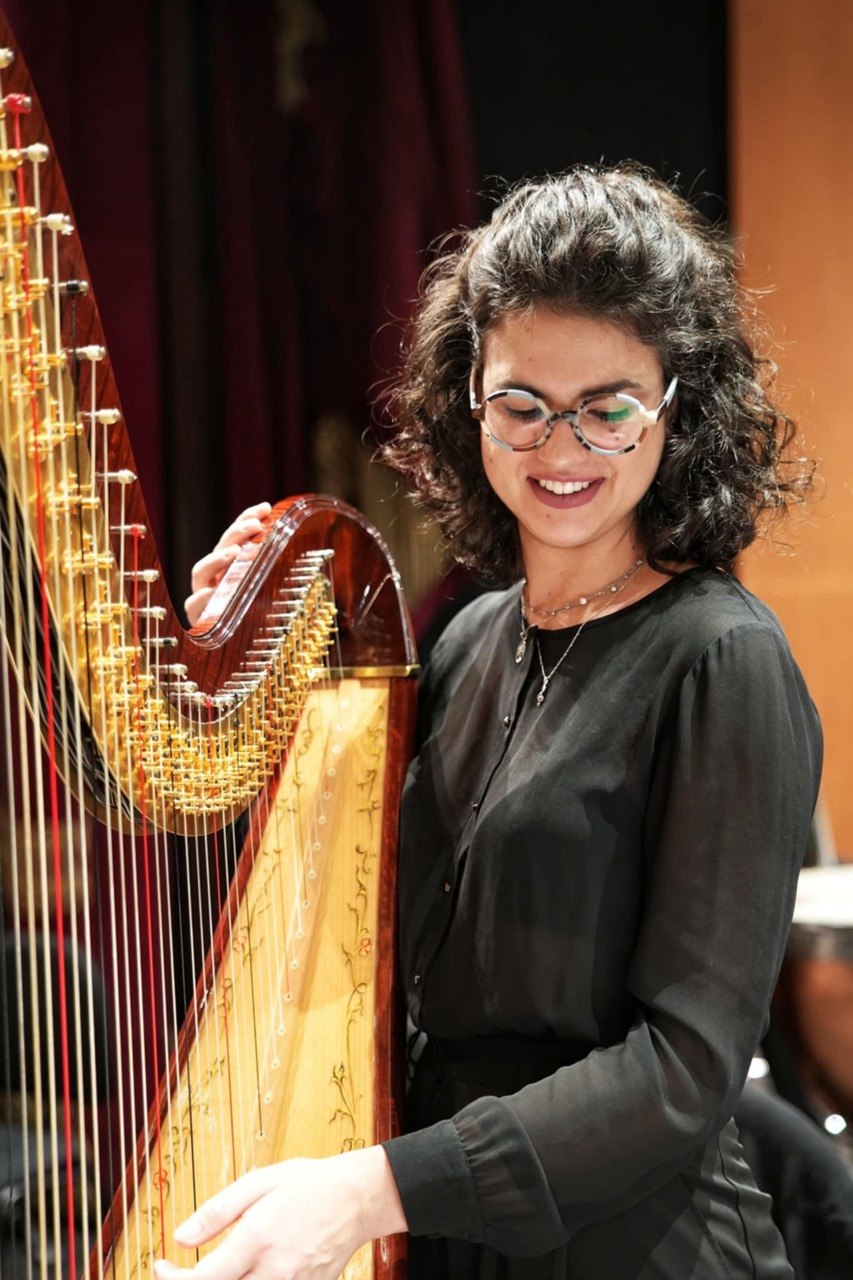 Irene Pauletto with her harp